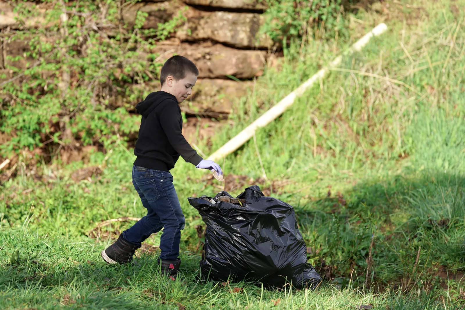 Cleanup volunteers at Will Rogers Gardens